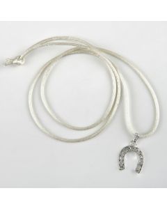 Horseshoe with ivory ribbon