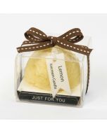 Candela aromatica con nastro profumo limone 6x6cm