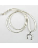 Horseshoe with ivory ribbon